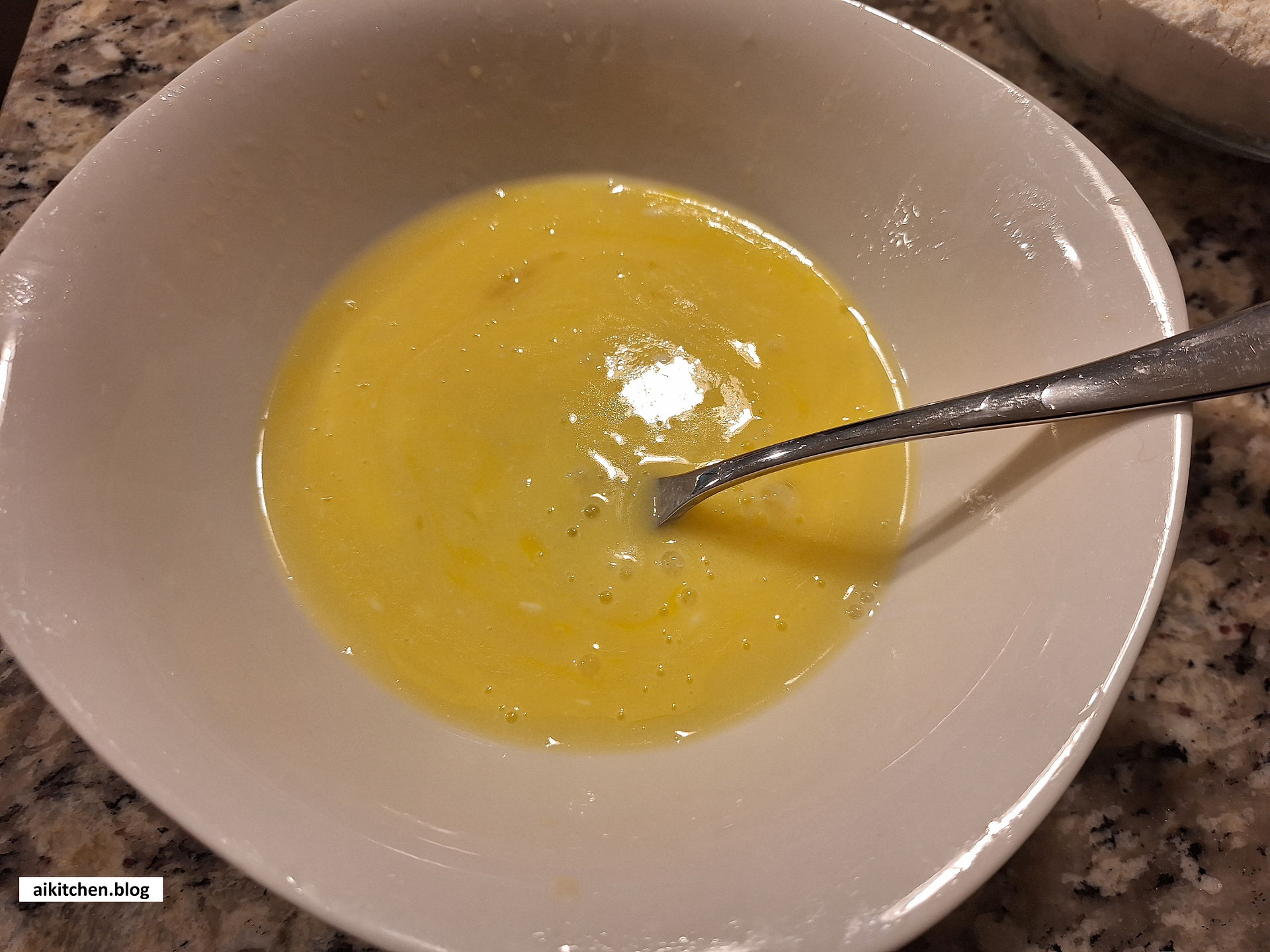 Mix in the eggs and melted butter until smooth.