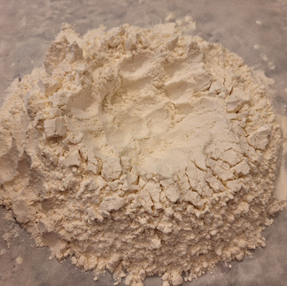 On a clean surface or in a large bowl, pile the flour and make a well in the center. Add eggs (and optional oil/salt). Use a fork to slowly incorporate flour into the eggs until a sticky dough forms.