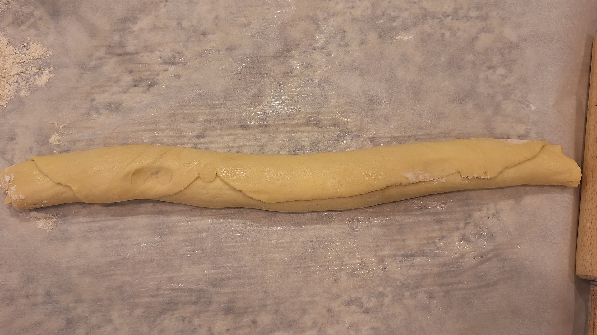 a log of rolled dough