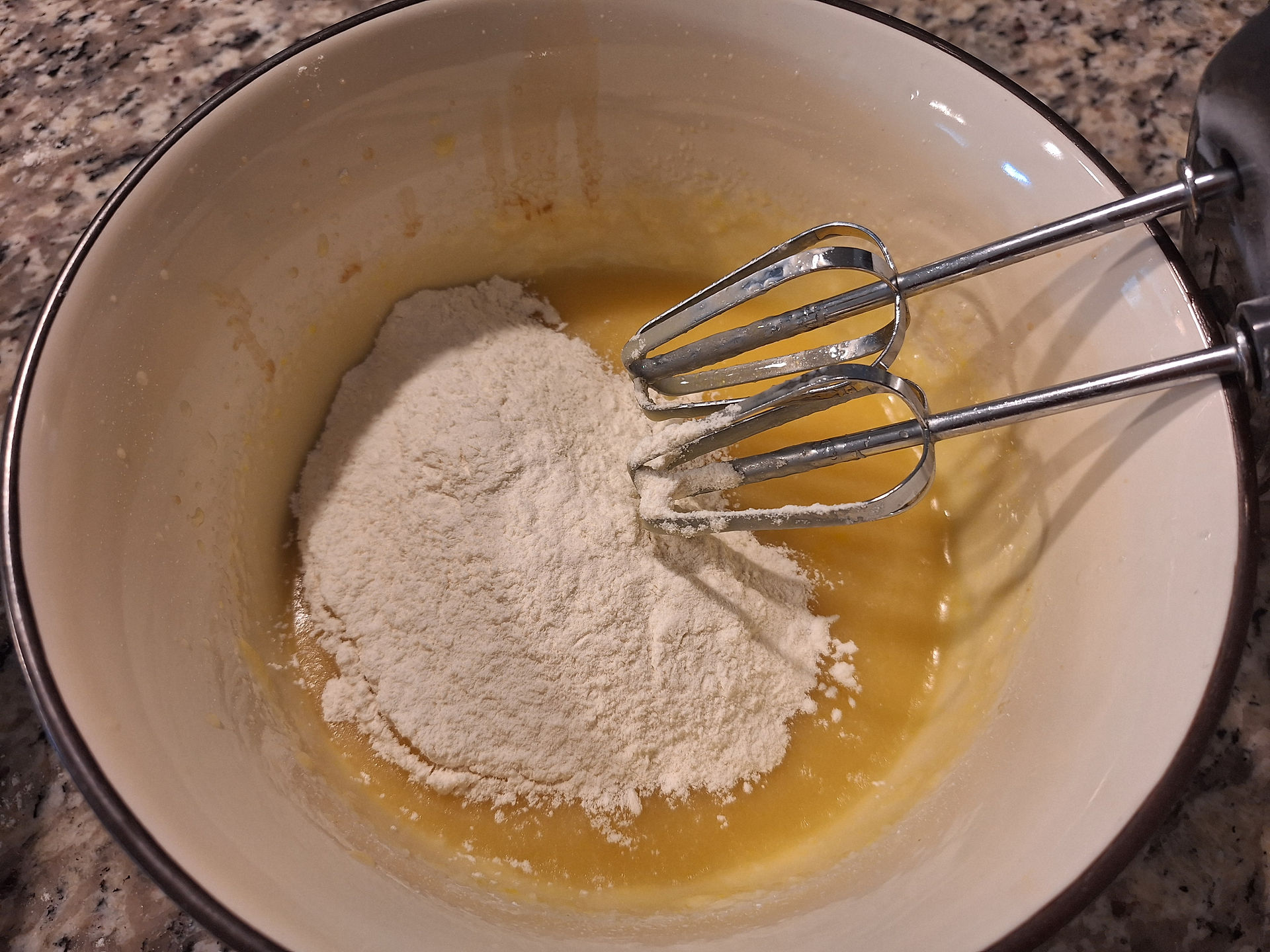 In a large bowl, cream together butter, oil, powdered sugar, and granulated sugar until light and fluffy.  Mix in the egg and vanilla until smooth.  In a separate bowl, whisk together flour, salt, and baking powder.  Gradually mix dry ingredients into wet ingredients until a soft dough forms.  Fold in sprinkles gently to prevent color bleeding.  If the dough is too soft, chill for 30 minutes.