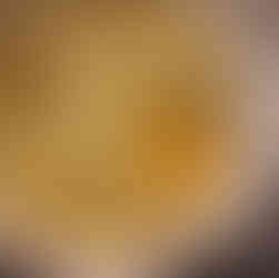 Cool a little and add yolk.