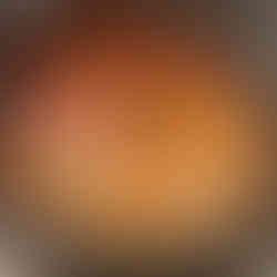 Combine lentils, tomatoes, diced onion, garlic, ginger, tamarind paste, vegetable broth, turmeric, cumin, coriander, garam masala, red chili powder, and salt in the slow cooker. Stir to mix.