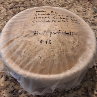 Preheat oven to 475°F (245°C) with a Dutch oven inside for at least 30 minutes. Turn the dough out onto parchment, score with a sharp blade or lame, and carefully place into the preheated Dutch oven. Bake covered for 20 minutes Then uncover, reduce temperature to 450°F (230°C), and bake another 20–25 minutes until deeply golden and internal temperature reaches ~205°F (96°C).