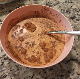 Add the softened butter and milk. Stir until smooth and well blended.