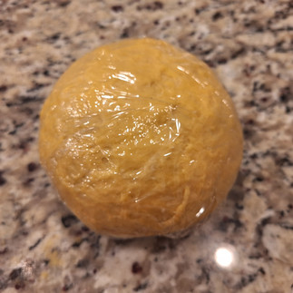 Wrap tightly in plastic wrap. Let rest at room temperature for 30 minutes to 1 hour. This relaxes the gluten and makes rolling easier.