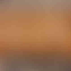 While still hot, brush with melted butter for shine and softness.