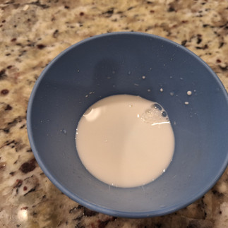 In a small saucepan, melt 1 tsp butter. Add grated carrot and cook for 2–3 minutes until slightly softened. Stir in orange juice, mashed dates, maple syrup, cinnamon, and ginger. Simmer for 3–4 minutes. In a small bowl, mix cornstarch and water. Stir into the carrot mixture and cook for 1–2 minutes until thick. Let the filling cool completely. Stir in raisins if using.