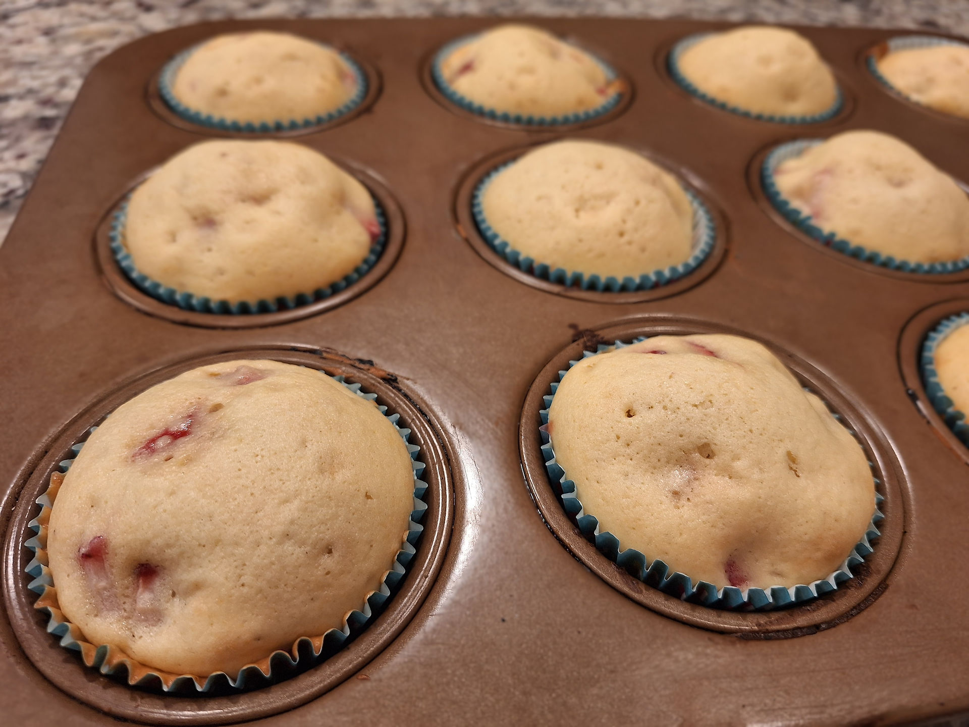 Allow the muffins to cool in the pan for 5 minutes before transferring them to a wire rack. Serve as is or dust with powdered sugar for a light, sweet touch.