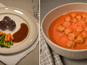 Plate with meatballs, carrots, broccoli, and sauce on beige tablecloth. Bowl of meatballs in red sauce with gray napkin. Warm, homey setting.