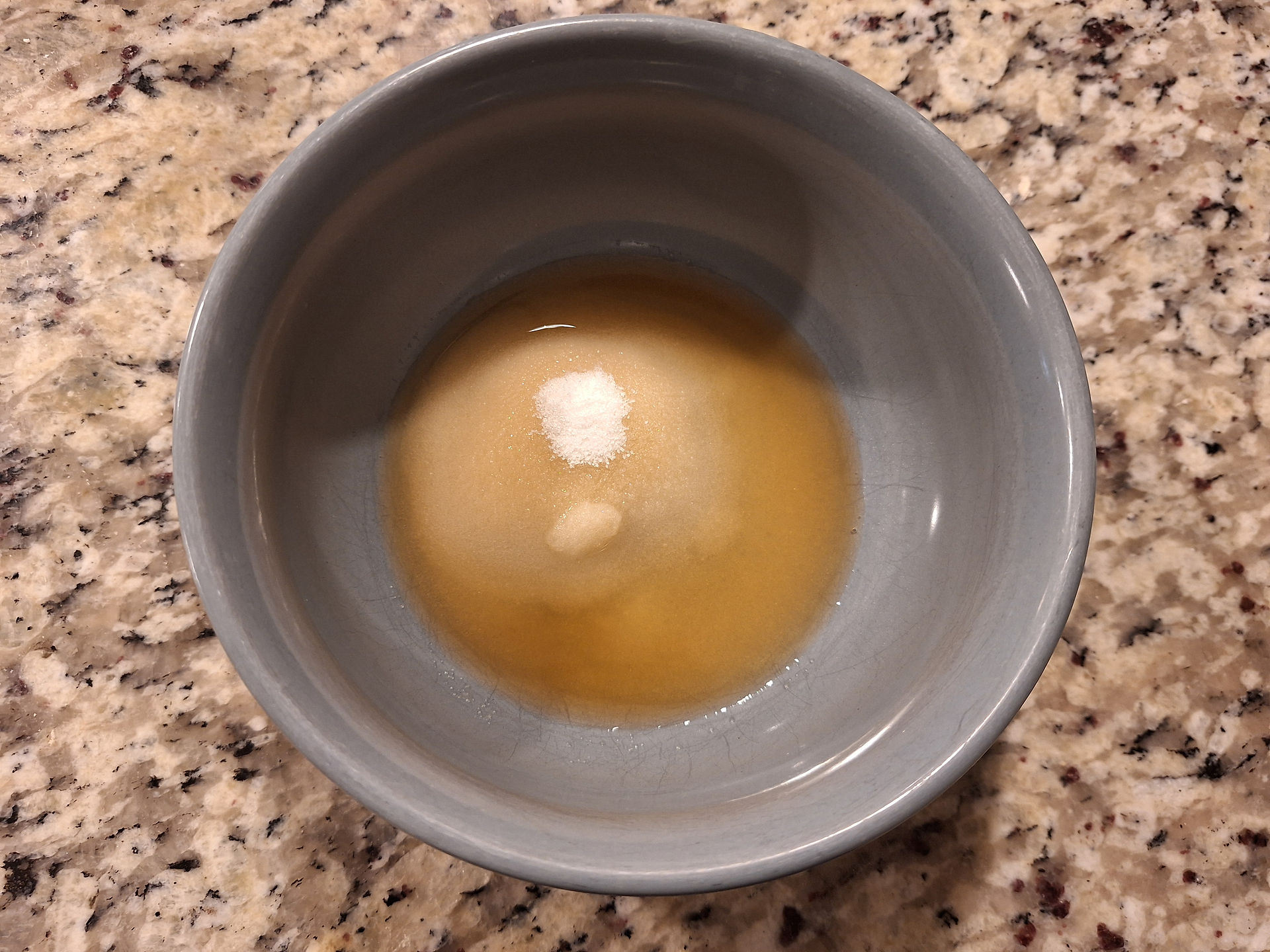 Rinse the Calrose rice 3–5 times until water runs mostly clear.  Soak for 20–30 minutes, then drain.  Add rice and 2½ cups water to a pot. Bring to a boil, cover, reduce heat, and simmer for 15 minutes.  Let sit covered off the heat for 10 minutes.  Warm the vinegar, sugar, and salt until dissolved. Let cool.  Transfer rice to a wide bowl. Pour vinegar mixture evenly over rice and gently fold with a spatula. Fan while folding to cool and gloss the rice. Let come to room temperature.