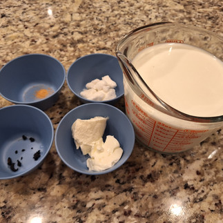 4 cups (1 liter) skim milk (or whole milk for creamier skyr) 1-2 tablespoons skyr or plain Greek yogurt (as a starter culture) 1/32 teaspoon powdered rennet (optional, for better texture) Seeds from 1 vanilla bean (or 1 teaspoon pure vanilla extract, added after straining) 24 grams sugar (6 grams per serving) A thermometer Cheesecloth or a fine strainer