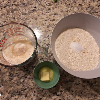 3 ⅓ cups all-purpose flour ¾ cup bread flour 1 ½ teaspoons salt 1 ⅓ cups warm milk (90–95°F) ½ cup active sourdough starter (fed 4–8 hours ago) 2 tablespoons sugar or honey Optional: ¼ teaspoon instant yeast (for a reliable rise) 2 tablespoons softened butter