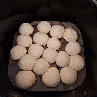 Spray the air fryer basket lightly with non-seed oil (like coconut oil). Arrange the donut holes in a single layer, leaving space between them. Air fry for 6–8 minutes, shaking the basket halfway through to ensure even cooking.
