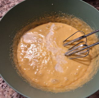 In another bowl, mix melted butter and sugar. Add eggs one at a time, beating well after each. Stir in milk and vanilla.