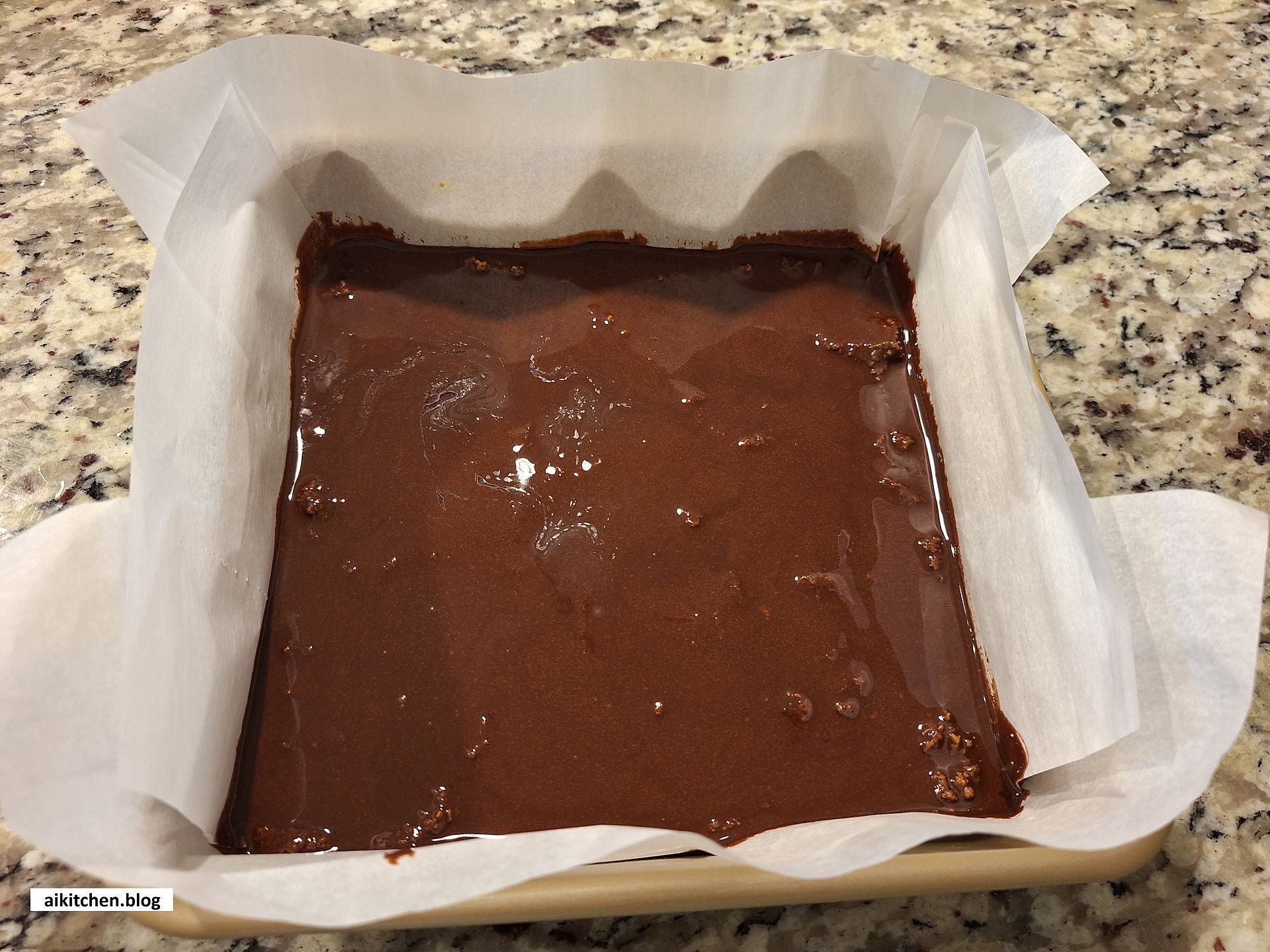 Spread evenly by lifting the pan and tilting slightly.