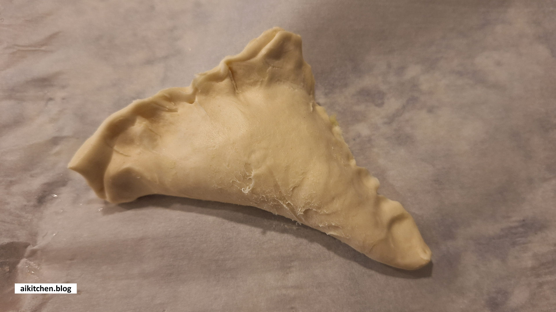 Tighten edges well (they open up when baked, so this is important).