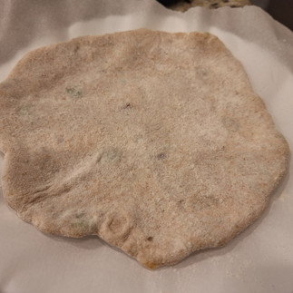 Carefully roll filled dough.