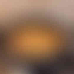 onions and carrots on frying pan, chopped, stirred and cooked with peppers and chopped hotdogs, center of pan with scrambled eggs, stirred and being cooked