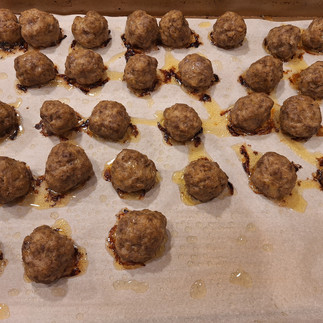 Preheat the oven to 375°F (190°C). Form the mixture into meatballs about 1.5 inches in diameter. Place the meatballs on a baking sheet lined with parchment paper or greased with oil. Bake for 20-25 minutes, or until the internal temperature reaches 160°F (71°C).