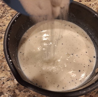 Remove the milk from the heat and stir in the sugar while it’s still warm, ensuring it dissolves completely.