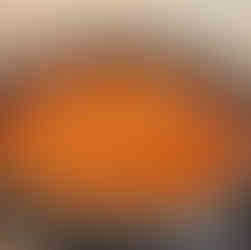 Gently transfer the baked meatballs into the sauce, cover the pot, and simmer for an additional 30 minutes on low heat.