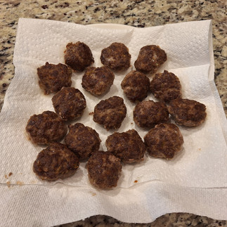 Heat beef tallow (or oil) in a wide skillet over medium to medium-high heat until it reaches 170–180°C (340–355°F). Fry half the patties 3–4 minutes per side until deeply golden and cooked through. Transfer to paper towels to drain.