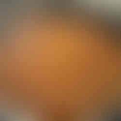 In a large pan, heat butter over medium heat. Add onion, garlic, carrot, and celery. Sauté until softened and lightly golden. Add the ground beef, breaking it apart and browning it evenly. Stir in tomato paste and cook for 1-2 minutes. Add red wine, scraping up any browned bits on the bottom of the pan. Let the wine reduce by half. Pour in the crushed tomatoes, balsamic vinegar, beef broth, and toss in the Parmigiano rind (if using). Simmer over low heat for 45-60 minutes, stirring occasionally. Season with salt and pepper to taste.