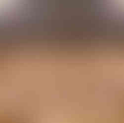 Cut the chilled dough into ½-inch thick rounds, place them on the baking sheet, and bake for 10-12 minutes until edges are golden but centers remain slightly soft.