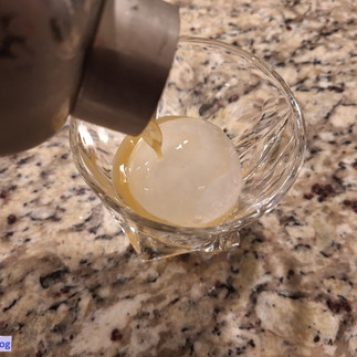 Strain and top with soda.