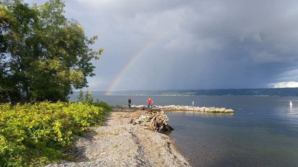 Seneca Lake with rainbow and author's children