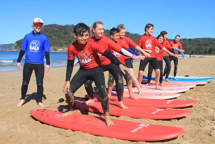 A real Sal's Surf School lesson in the water at Umina Beach