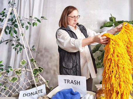 middle aged woman purging items