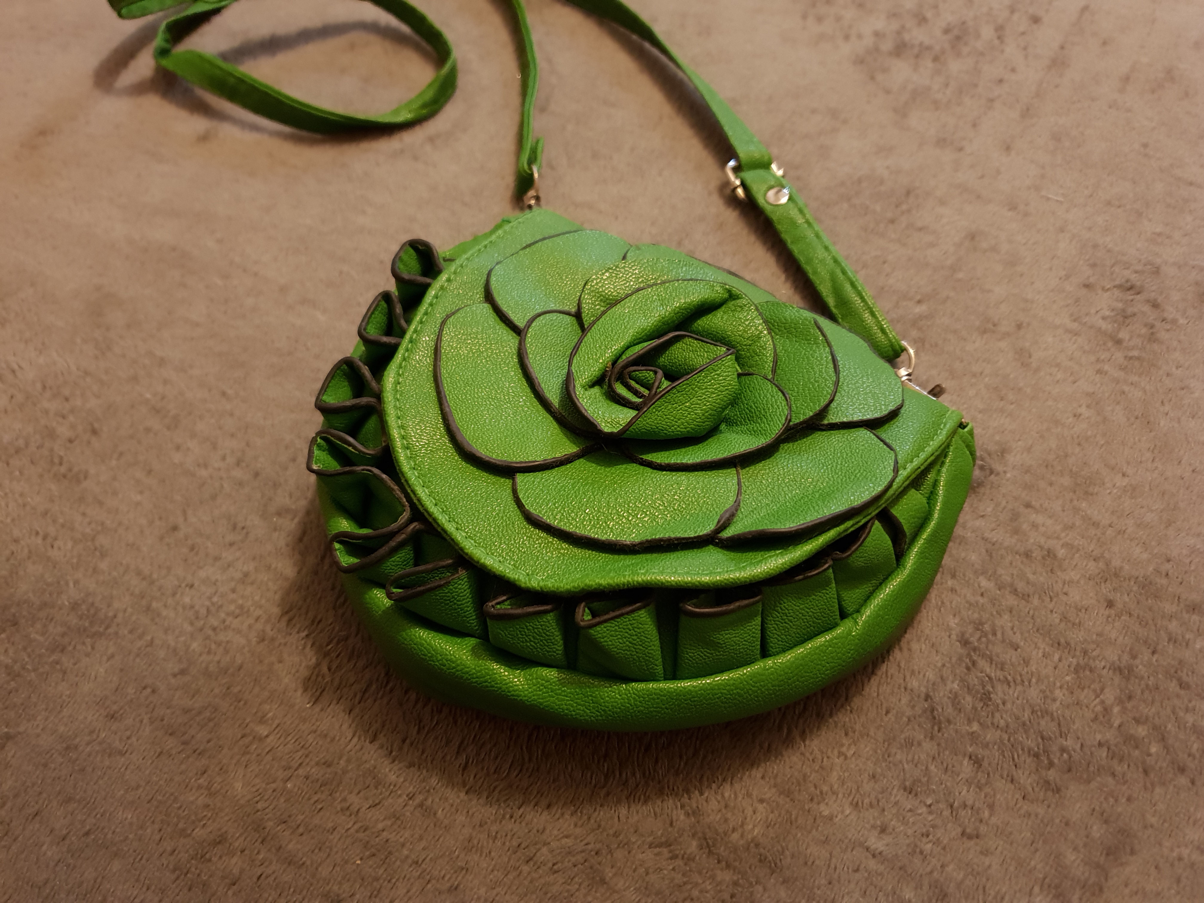 Green leather floral handbag