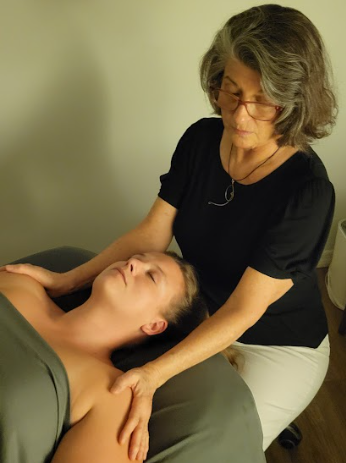 Therapist performing a light touch Sweet Session™