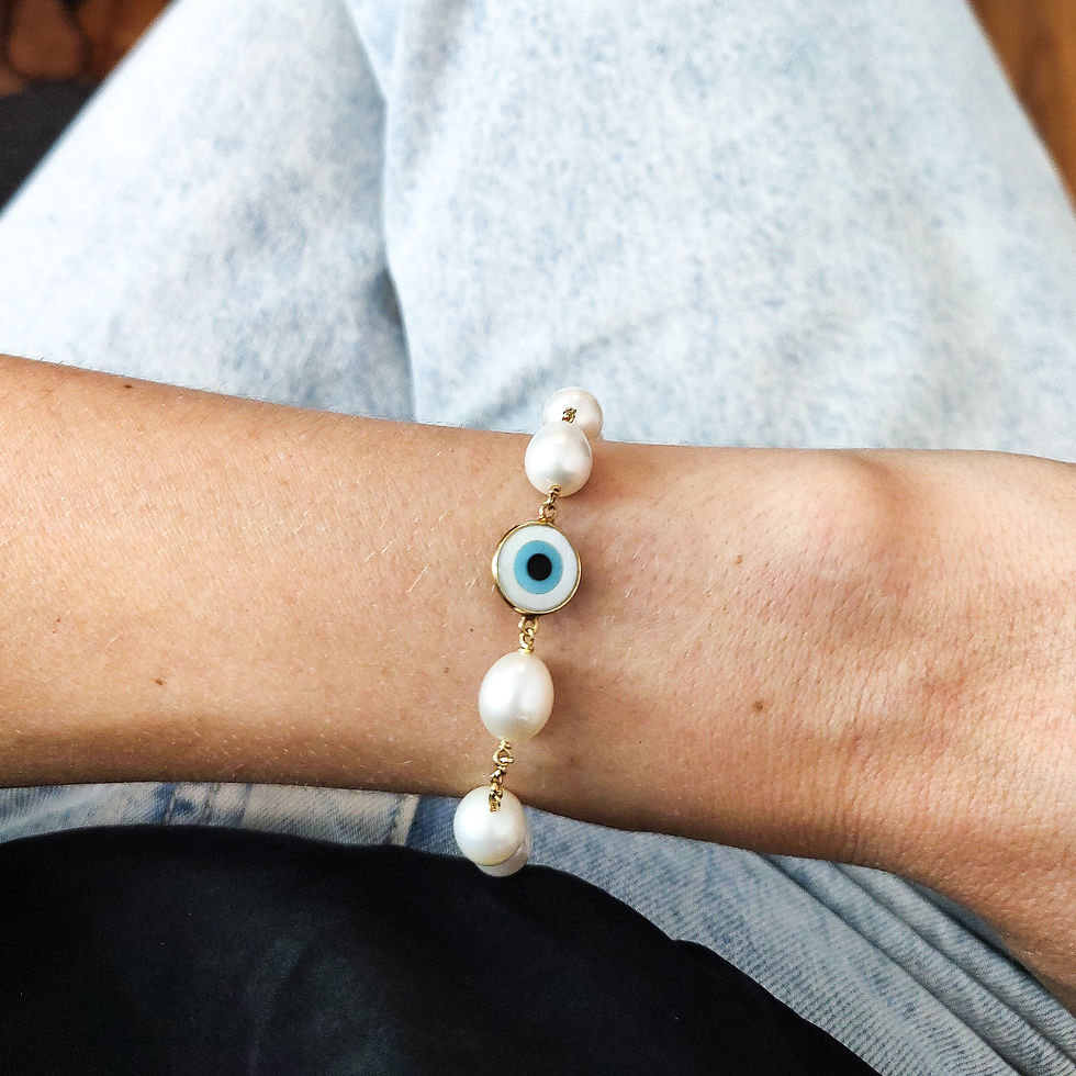 Miniatura: Pulseira com pérolas e olho grego