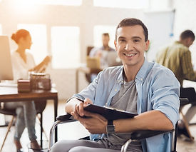 disabled-man-wheelchair-with-tablet-office_85574-7213.jpg