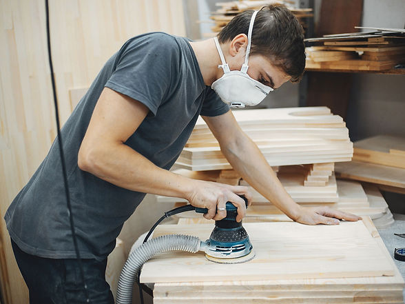 carpenter-works-with-tree-(1).jpg