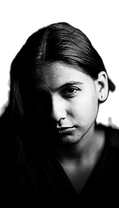 A woman with long hair is looking at the