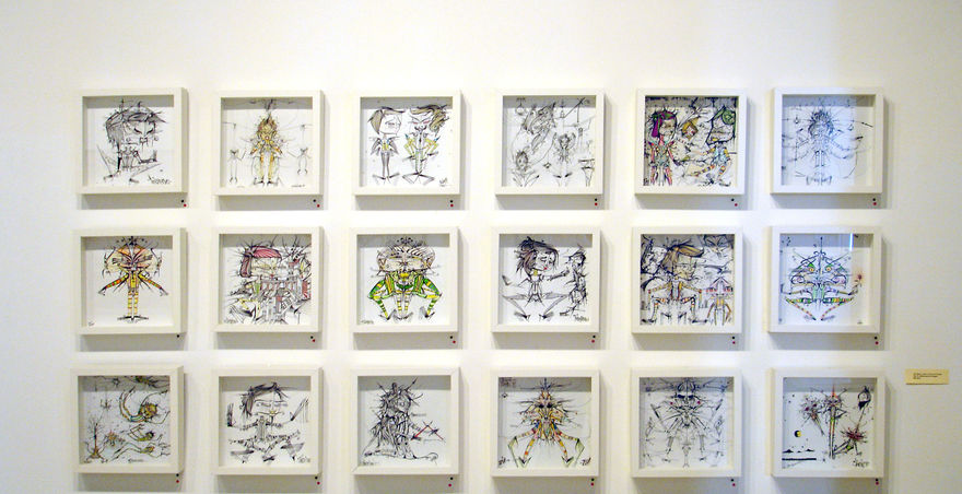 many small square drawings in white frames
