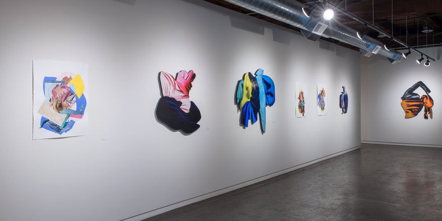 gallery with many colorful abstract paintings 