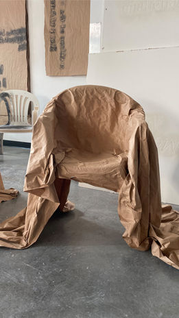brown paper in shape of chair