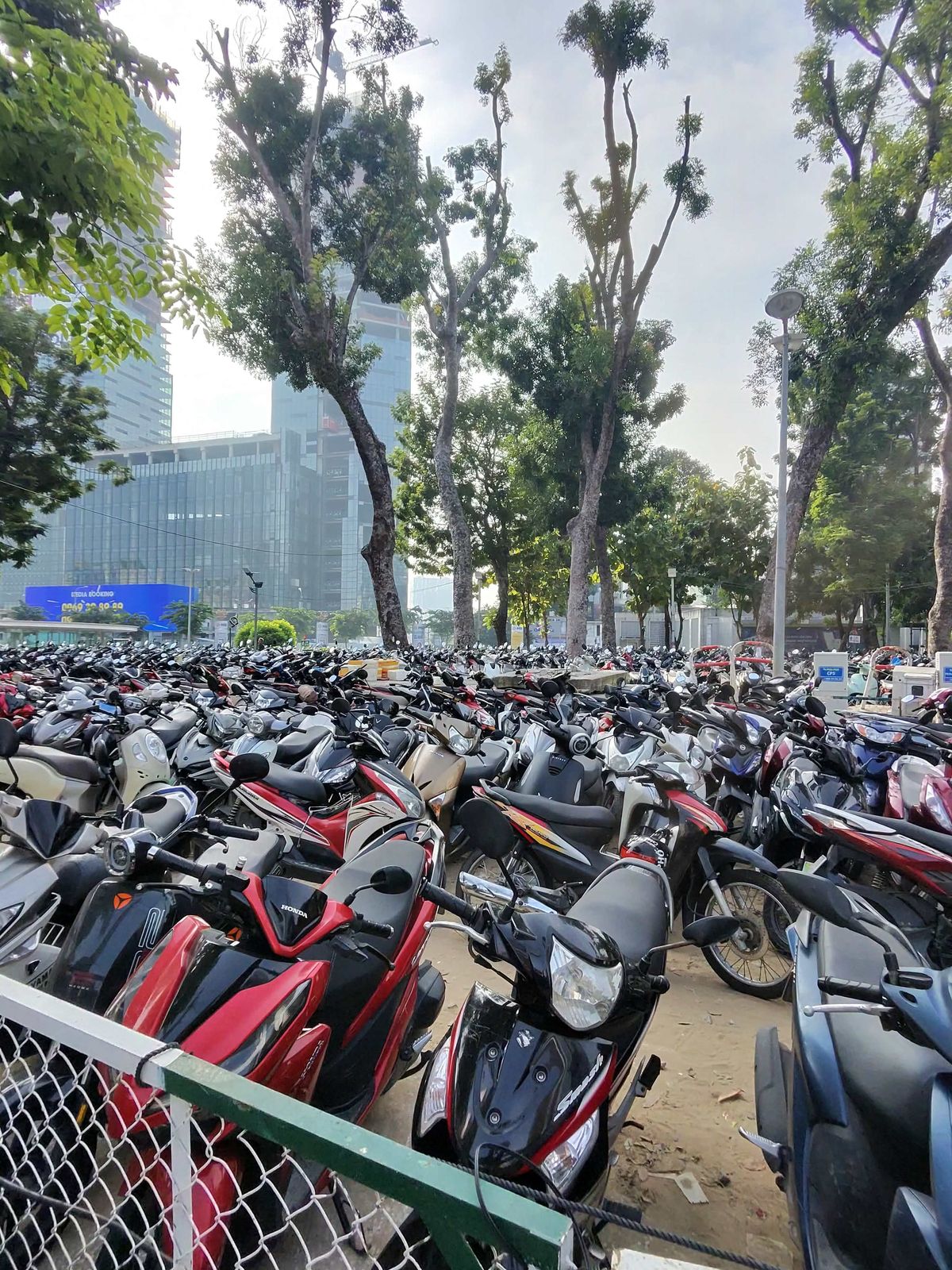 Scooters are a main mode of transportation here, and this is just one parking lot downtown.
