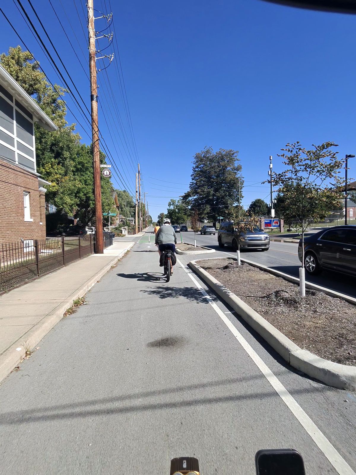 Indianapolis has lots of bike trails and in addition they have a huge network of curbed bike lanes.  Indianapolis is one of the best biking cities in the world.
