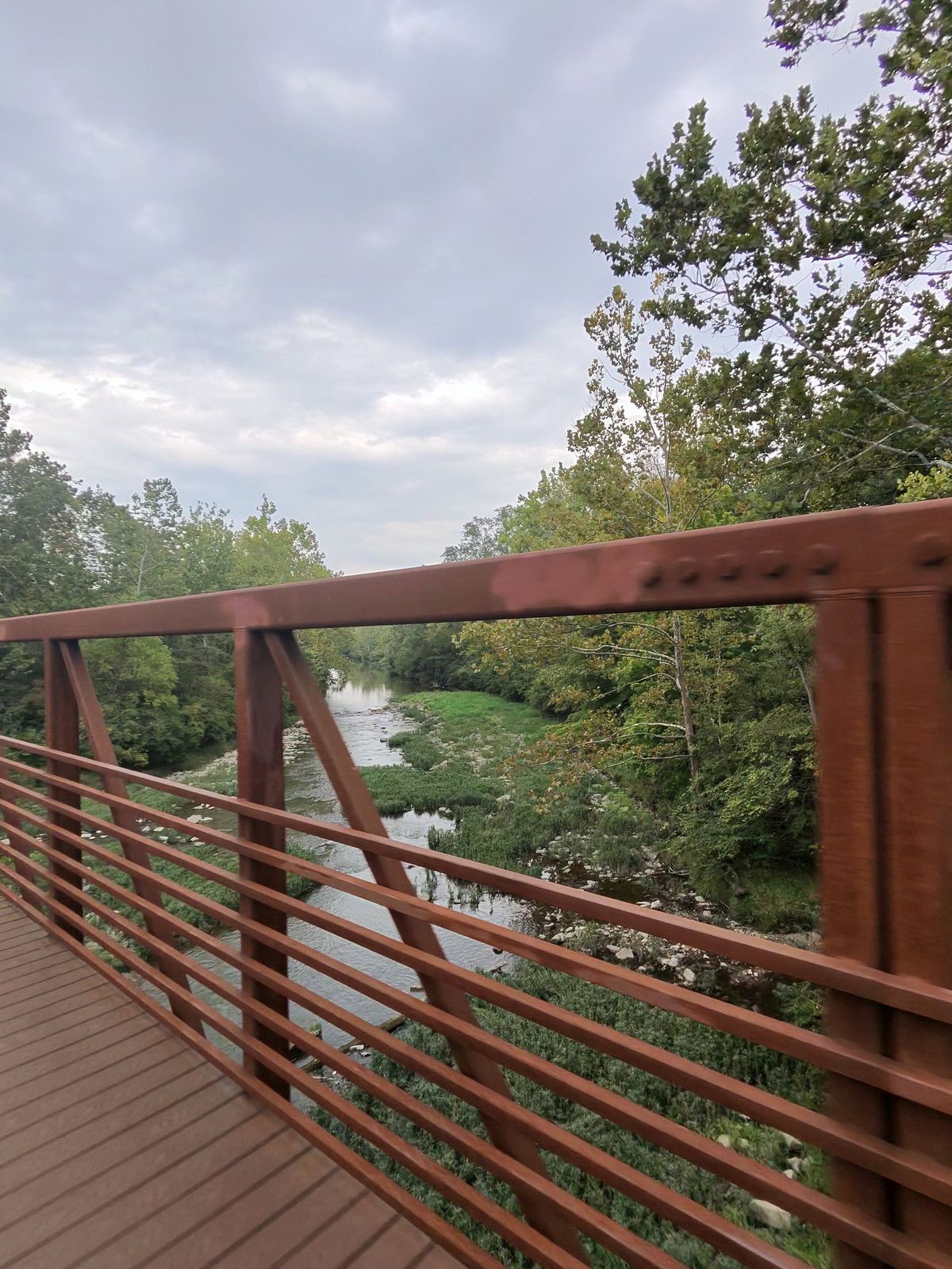We often stop at a bench by this bridge because it's pretty and relaxing.