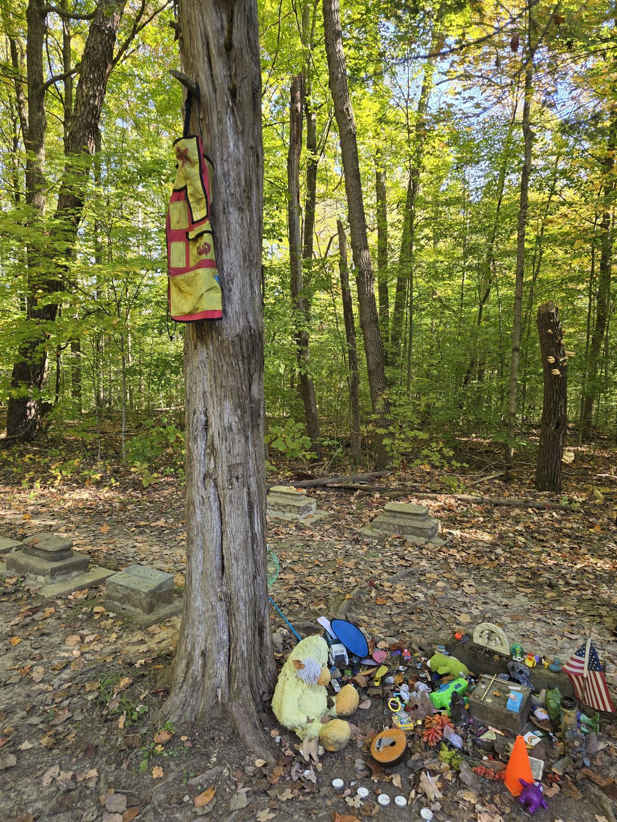 Our next stop was at the old Stepp Cemetery in Morgan-Monroe State Forest, where we visited the ever-popular grave of "Baby Lester". Eric's research said the Crabbites religious sect were popular in this area at that time, so Cara found it interesting that there was a crab on the apron hanging on the tree over the grave.