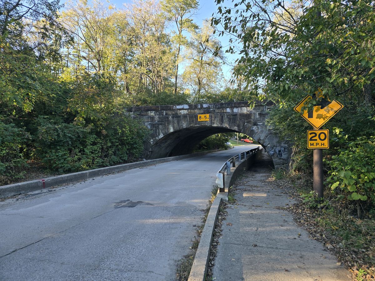 An interesting old bridge with low clearance - the sidewalk/bike trail dips down under the bridge for more clearance for pedestrians and cyclists.