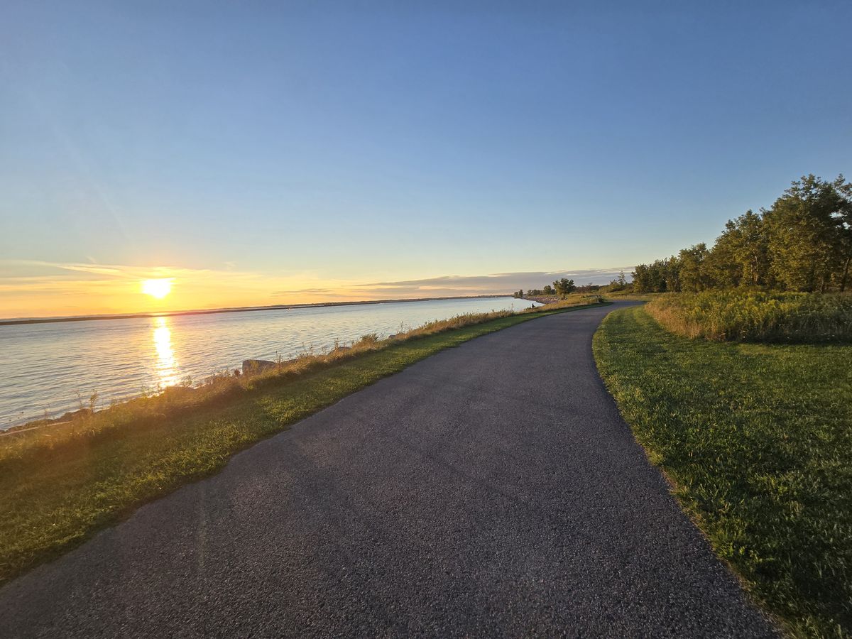 Then we biked on a riverside path to catch the sunset.