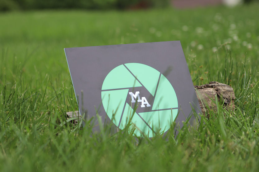 Logo in the grass.jpg
