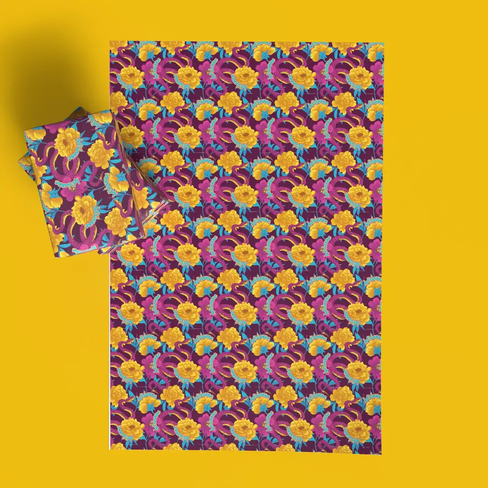 magenta snake and gold flower gift wrap