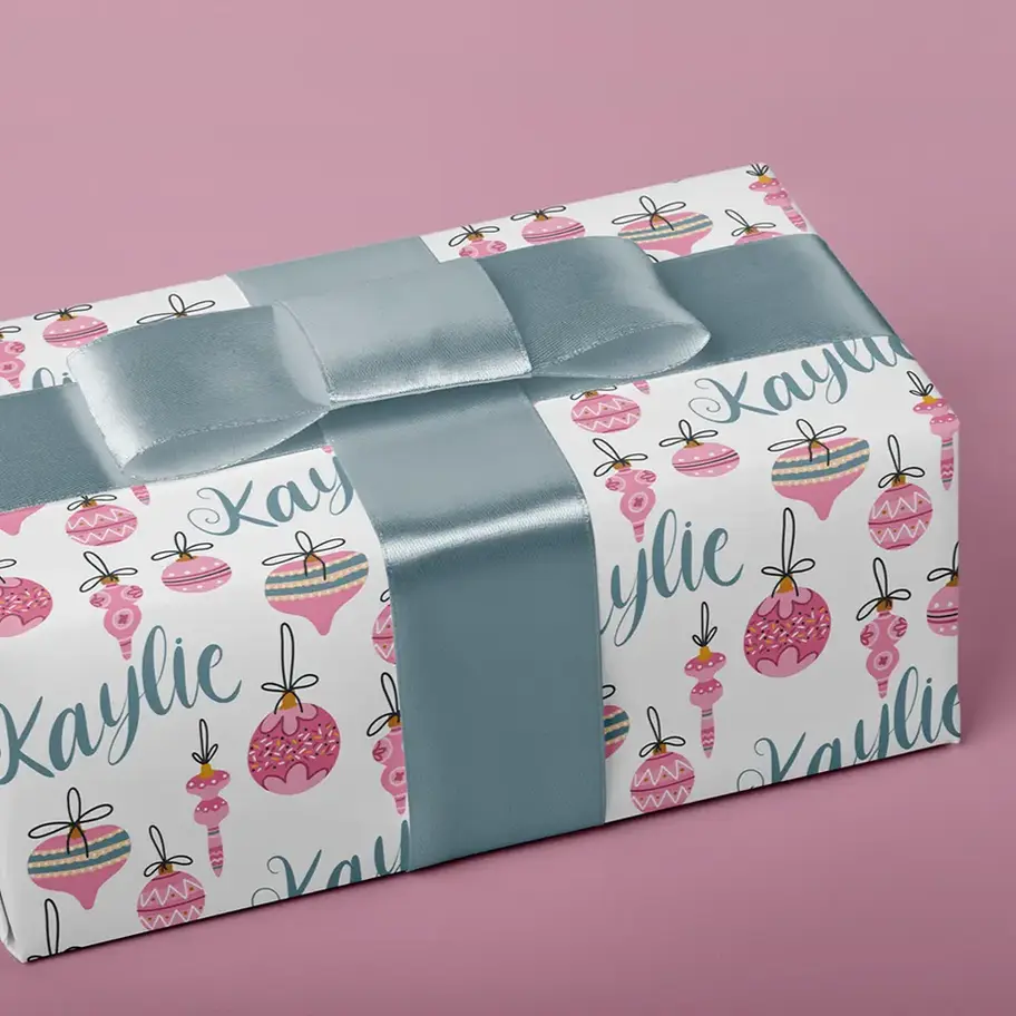 white christmas wrapping paper with pink ornaments personalized